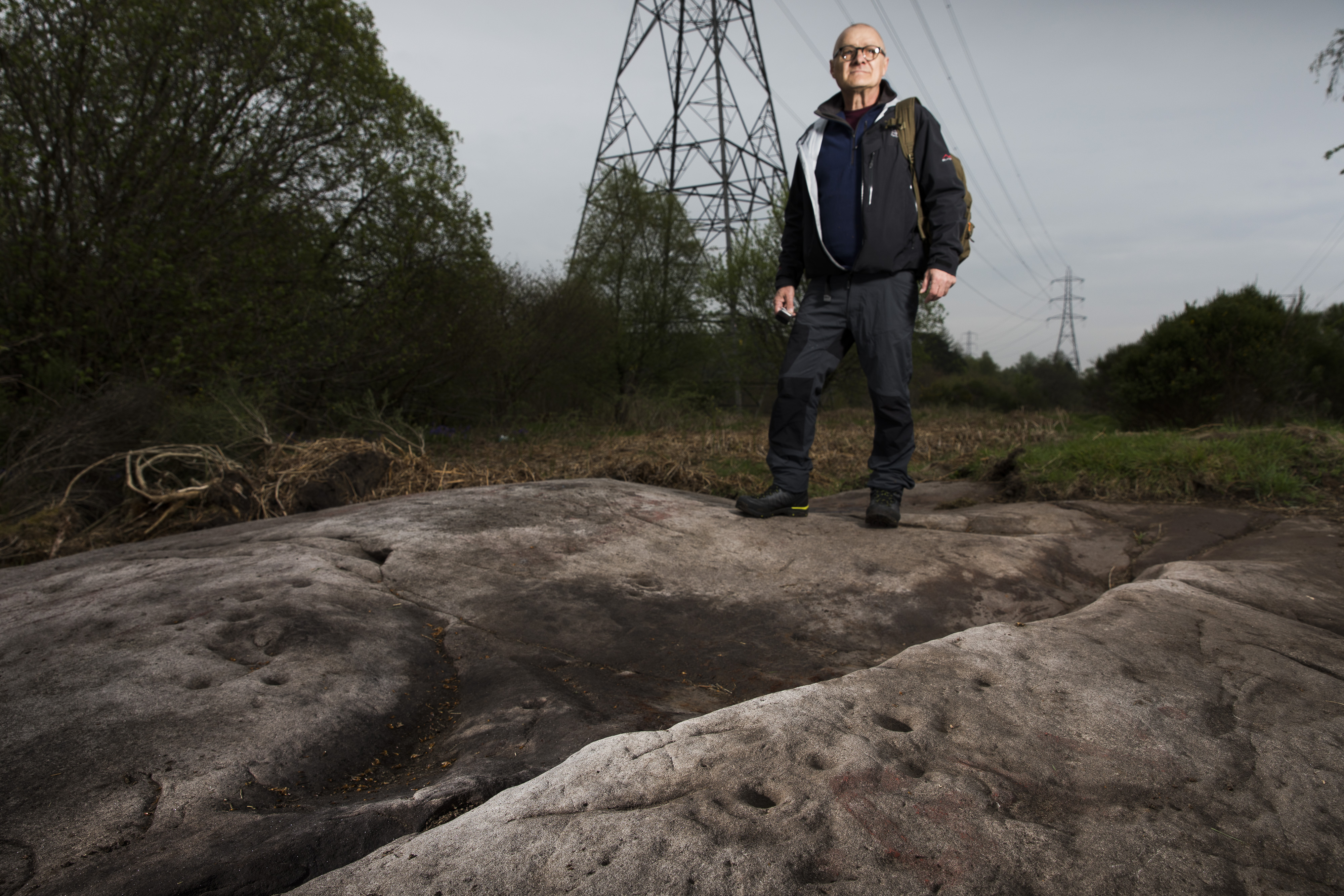 Gordon Morrison at the top of Waulking Mill Road in Faifley where there are some large rocks with cup and ring cravings possibly dating back to neolithic times…..