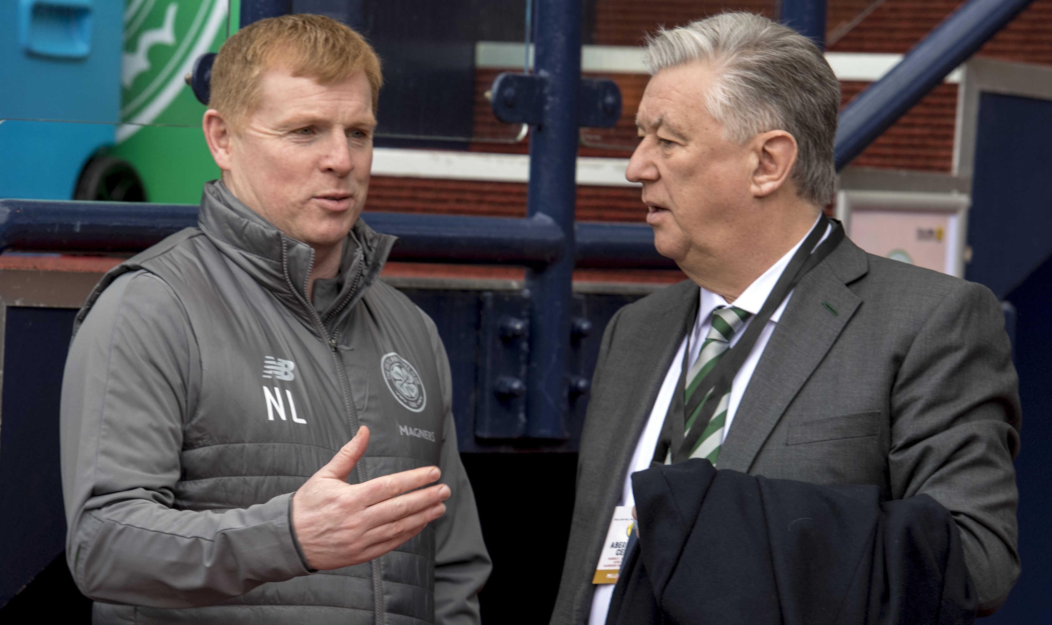 Celtic manager Neil Lennon (L) alongside club Chief Executive, Peter Lawwell