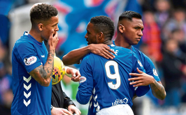 Jermain Defoe with Rangers teammates Alfredo Morelos and James Tavernier