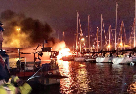 The moored yacht ablaze in Troon