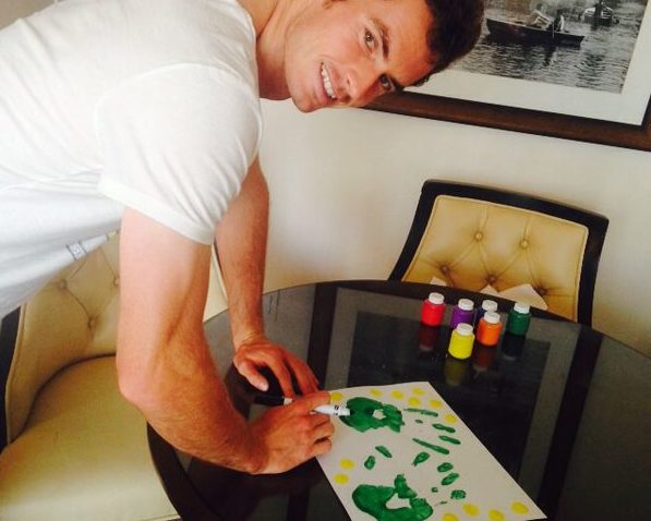 Andy Murray signs his handprints