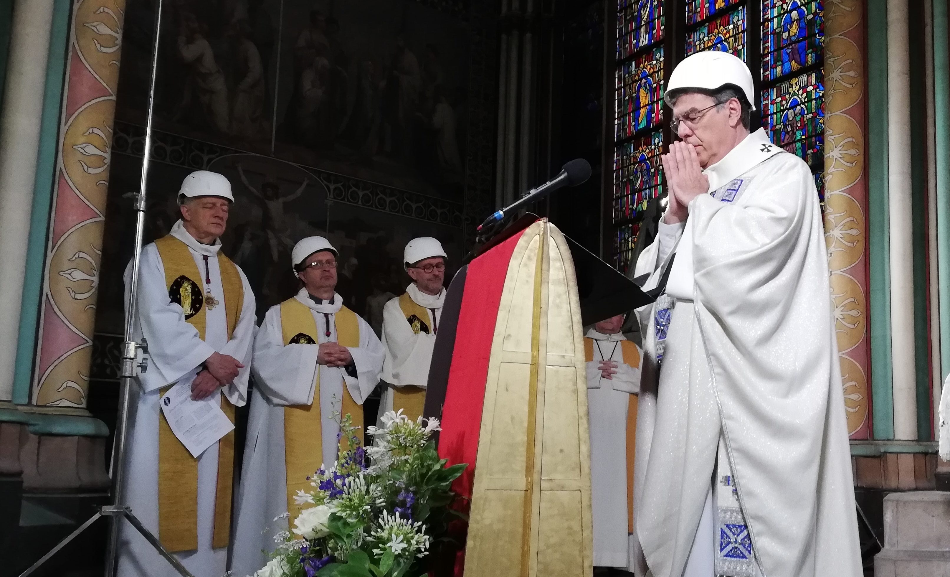 Pirests in hard hats host first mass in Notre Dame since April inferno