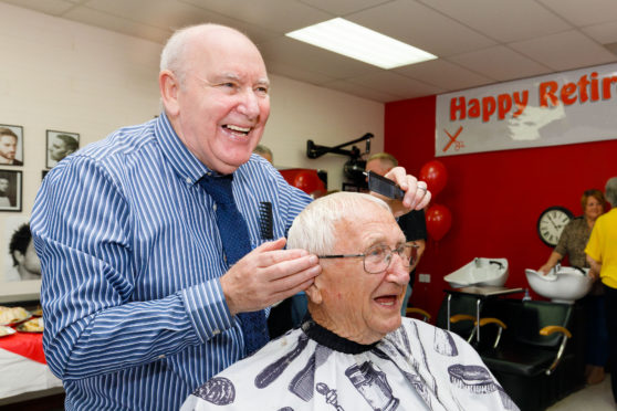 Retiring barber Milson Orr gives last haircut to same customer Frank Franklyn, 95, who he gave his first haircut to 57 years ago.