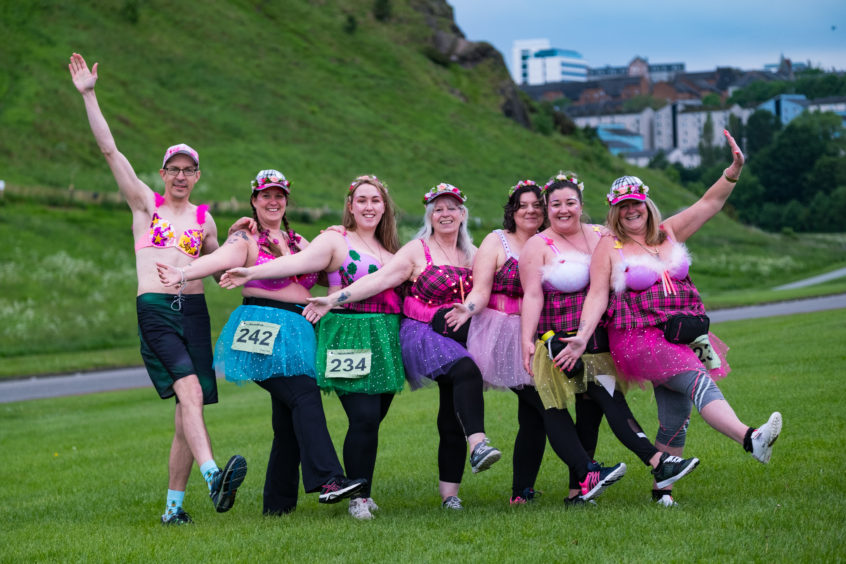 Walkers arriving for the start of the MoonWalk at Holyrood Park