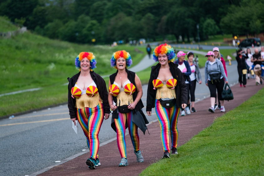 Walkers arriving for the start of the MoonWalk at Holyrood Park