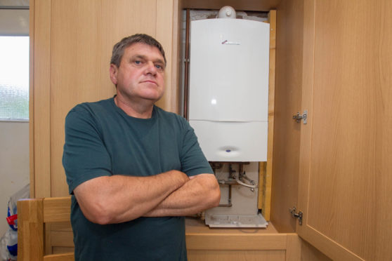 Donald Marquis bought a green boiler on credit and it is costing him a fortune.