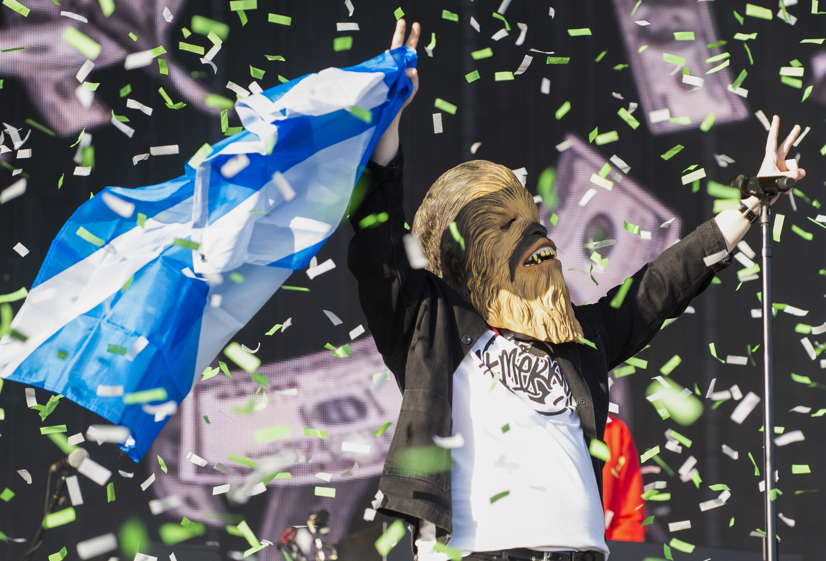 Lewis Capaldi on the Main Stage wearing a Chewbacca during the TRNSMT festival at Glasgow Green, Scotland. The signed mask has raised more than £5,000 for charity just 12 hours after going up for auction on Ebay.
