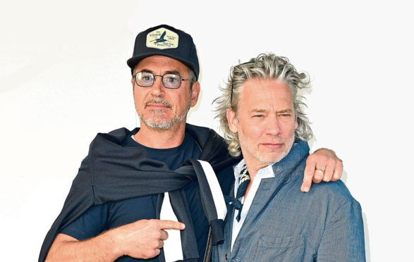 Dexter Fletcher (right) is set to direct Robert Downey Jr. as Sherlock Holmes