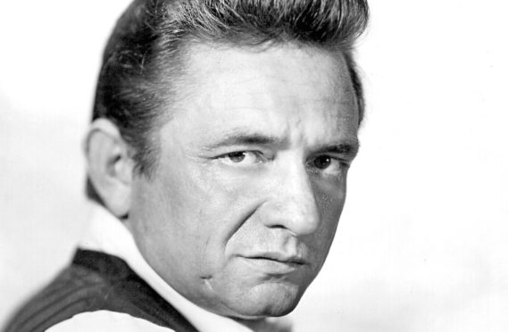 Johnny Cash poses for a portrait circa 1969