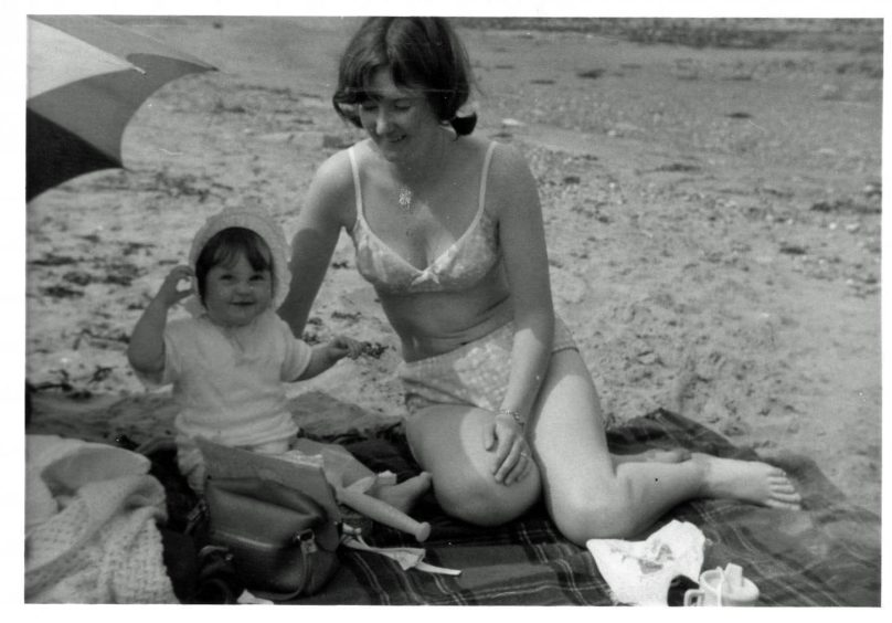Maxine Adams in Glen Luce, 1970. "Another happy beach day this time at Glen Luce with my daughter. We stayed on a farm holiday. It was wonderful, a working farm and the seaside too!"