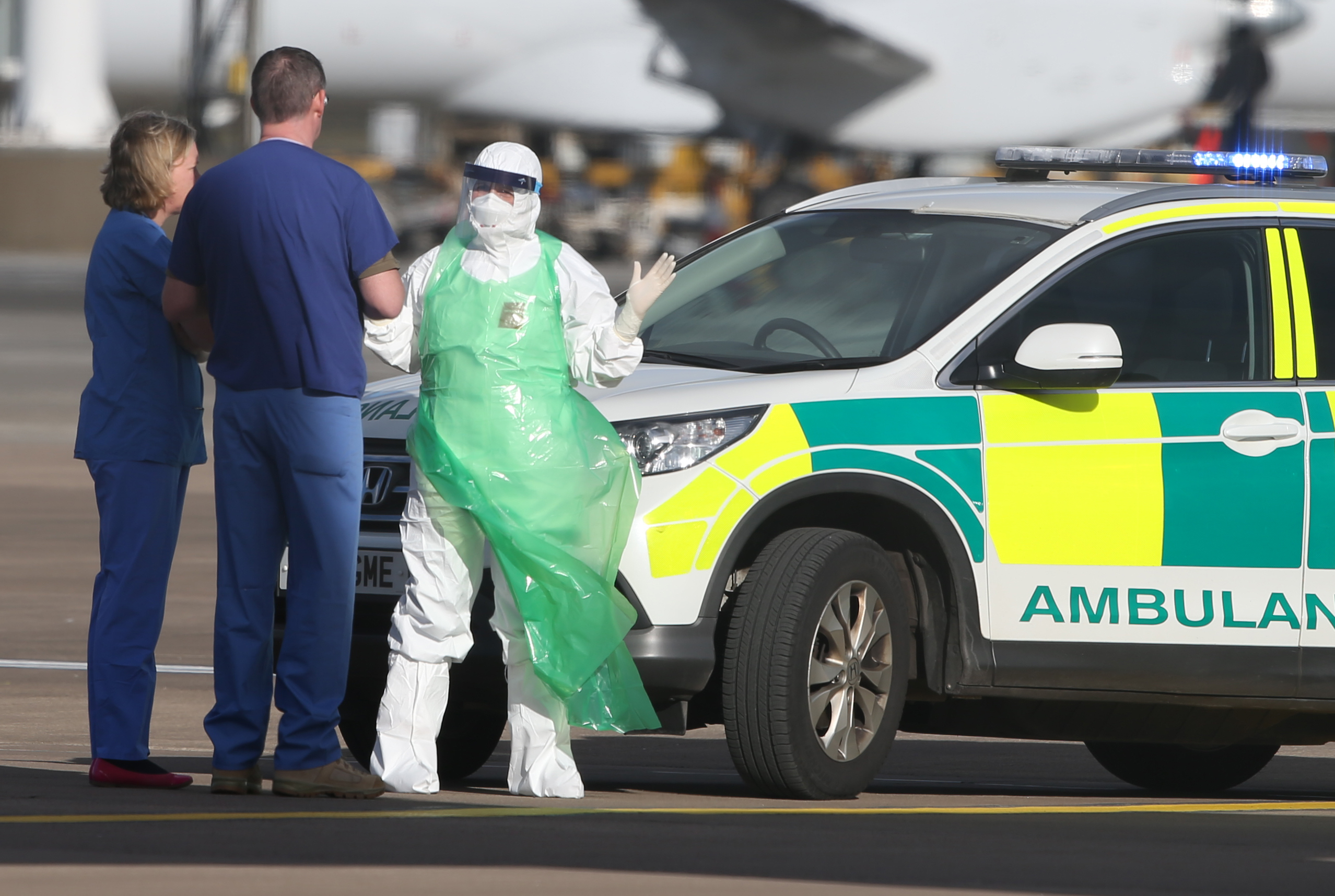 Medics after transfering nurse Pauline Cafferkey onto an RAF Hercules aircraft at Glasgow Airport before she is flown to London for treatment at the Royal Free Hospital after contracting Ebola.