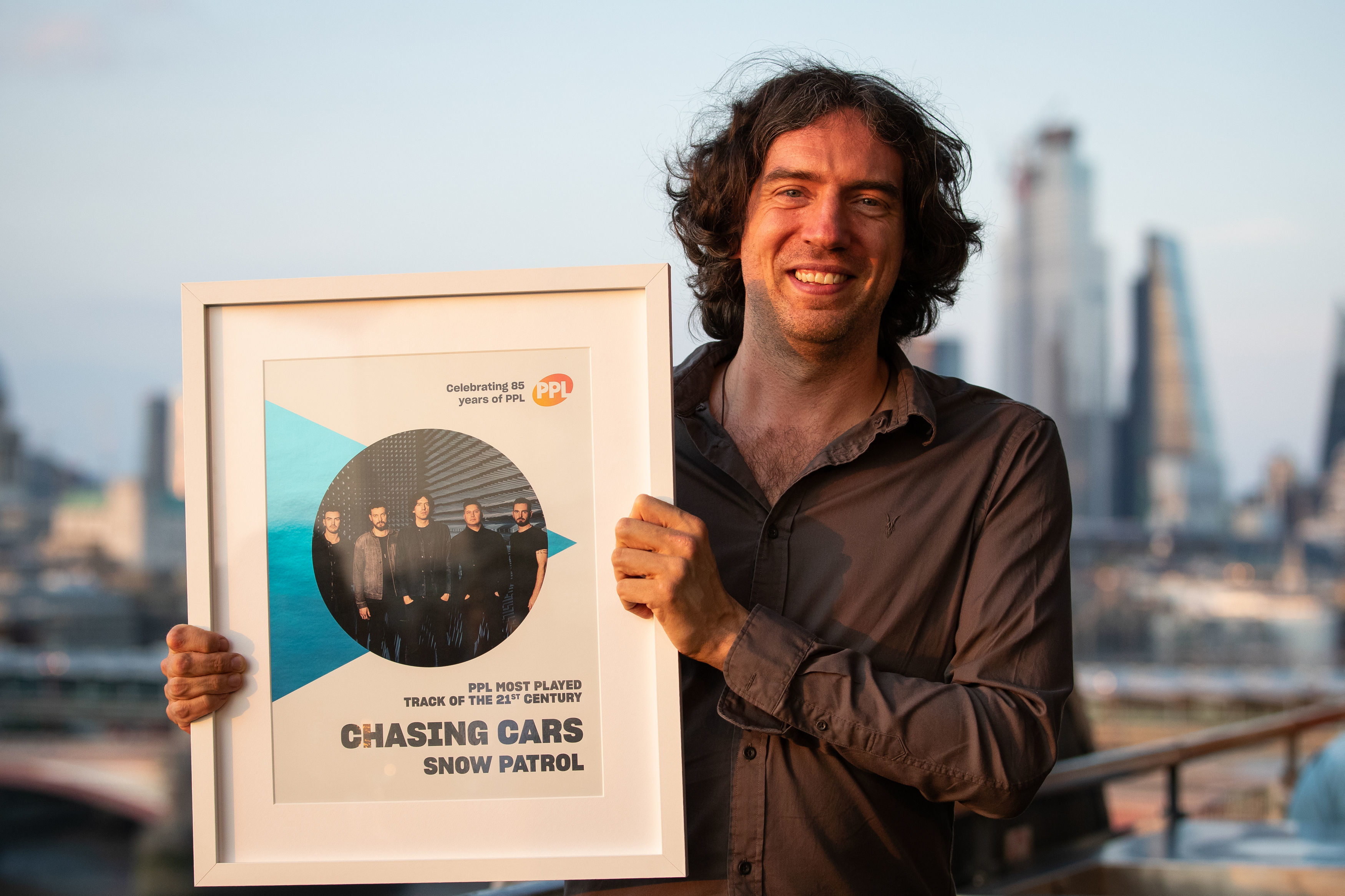 Frontman of Snow Patrol Gary Lightbody receives the award for Most Played song of the 21st century