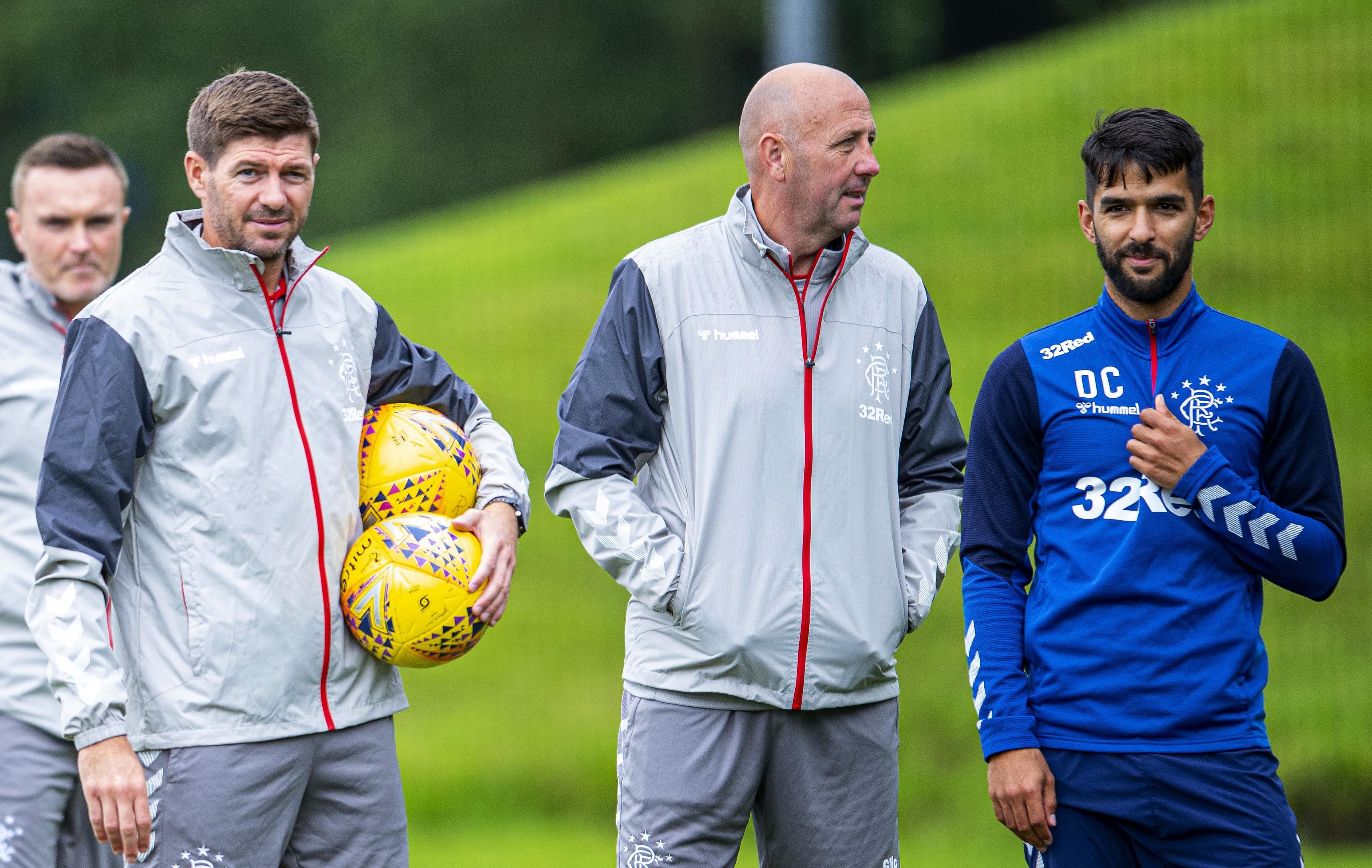 Rangers manager Steven Gerrard, assistant Gary McAllister, and Daniel Candeias