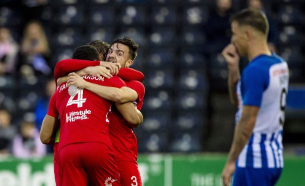 Connah's Quay's players celebrate at full time