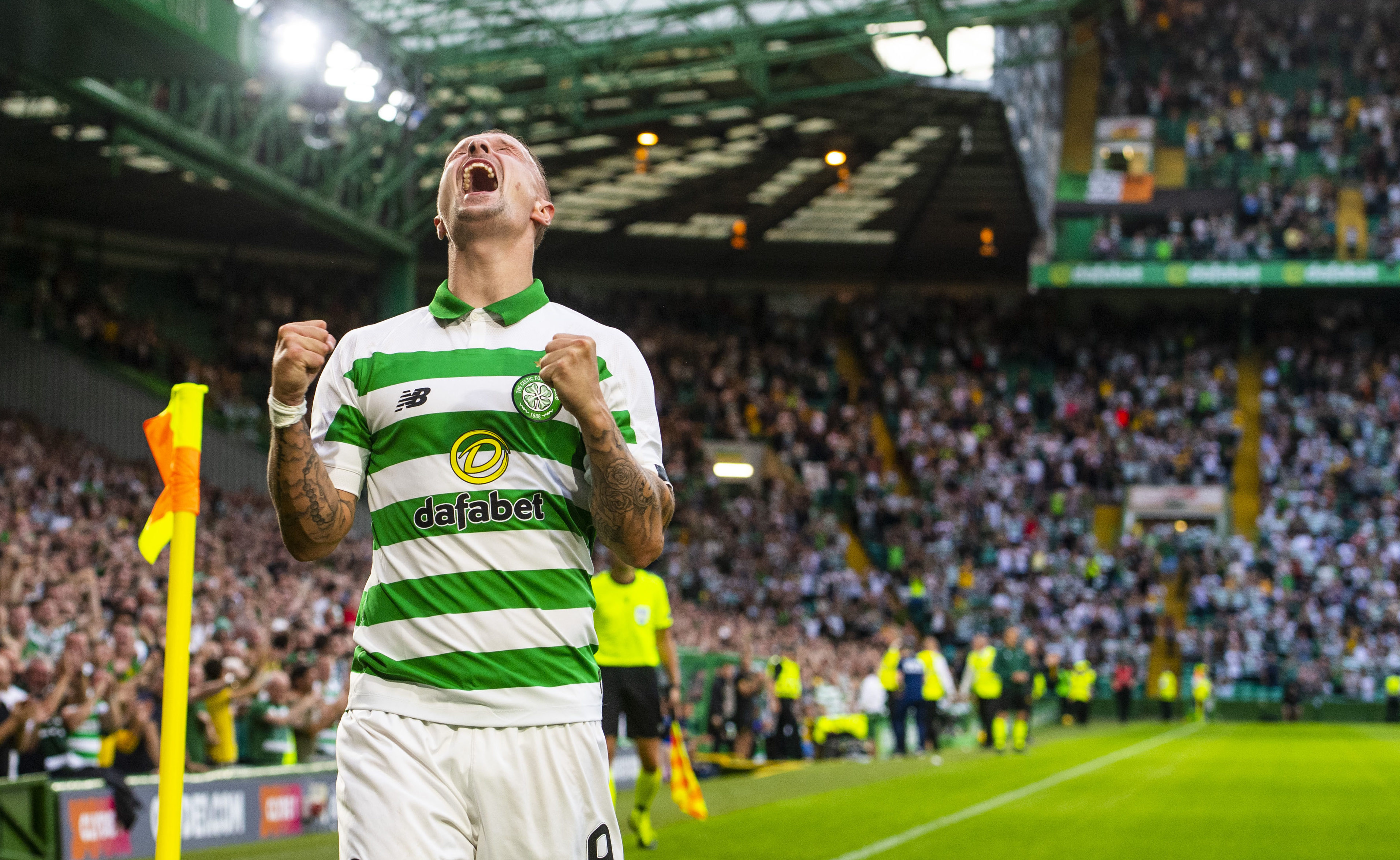 Leigh Griffiths celebrates after scoring to make it 3-0