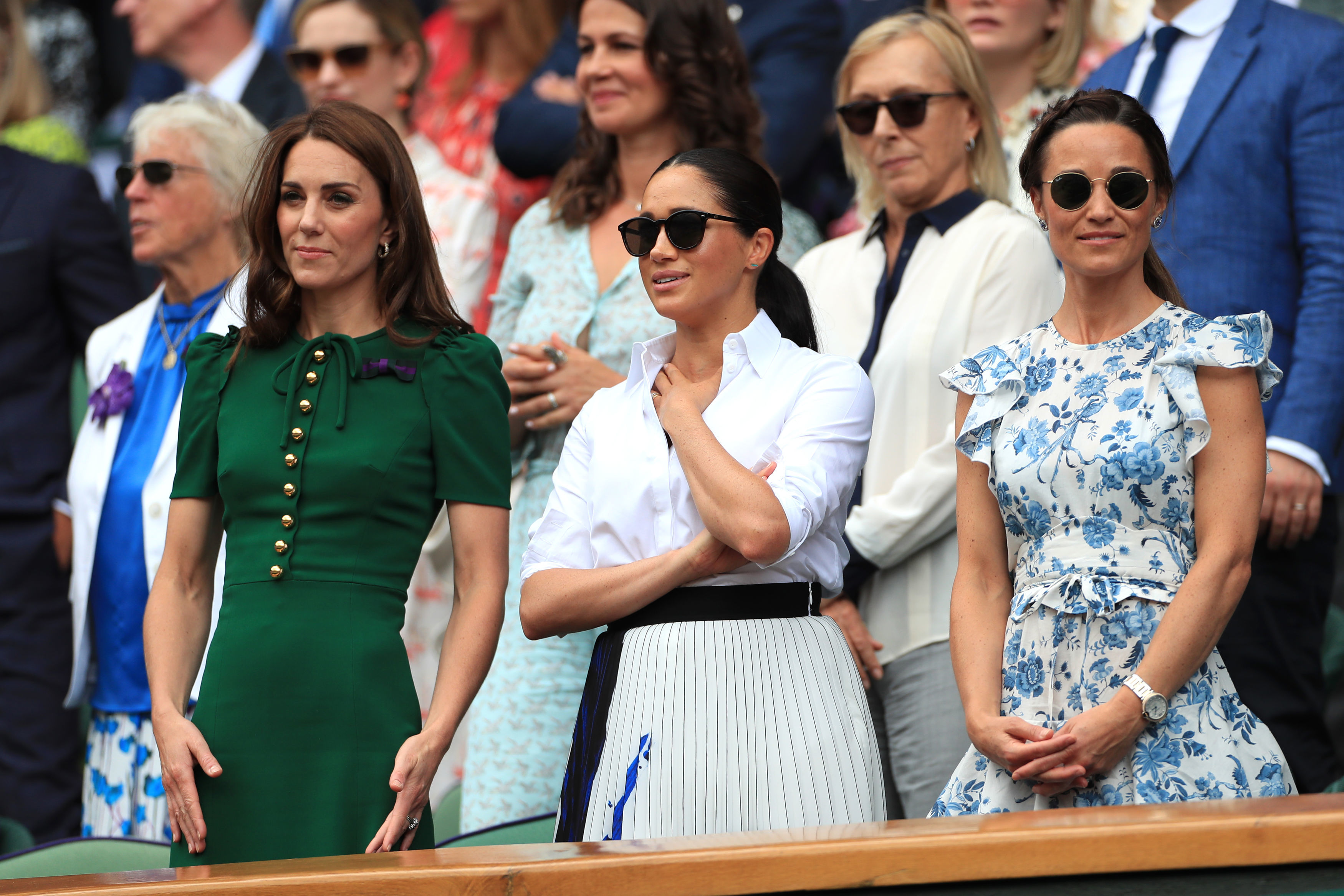 The Duchess of Cambridge and The Duchess of Sussex with Pippa Matthews on day twelve of the Wimbledon Championships at the All England Lawn Tennis and Croquet Club, Wimbledon.