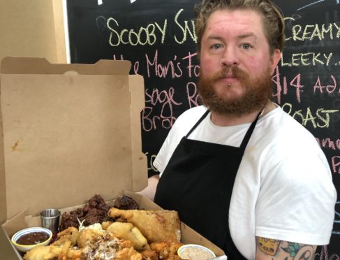 Chris with his Glasgow Mega Death – a munchie box containing at least 2,000 calories