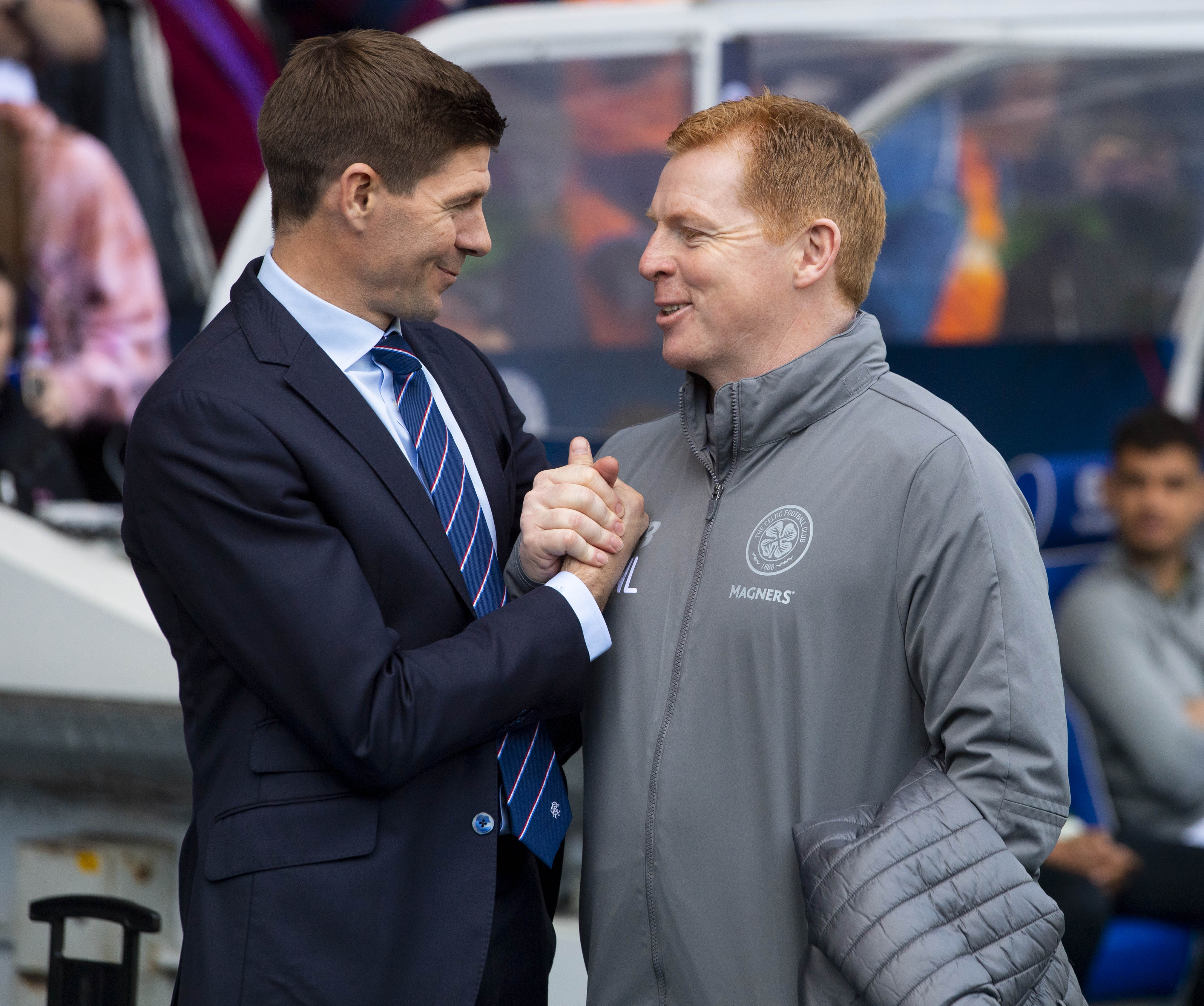 Rangers manager Steven Gerrard and Celtic manager Neil Lennon shake hands ahead of kick off