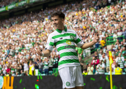 Mikey Johnston celebrates scoring the first goal of the Premiership season