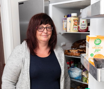 Lynette Pirie with her freezer.