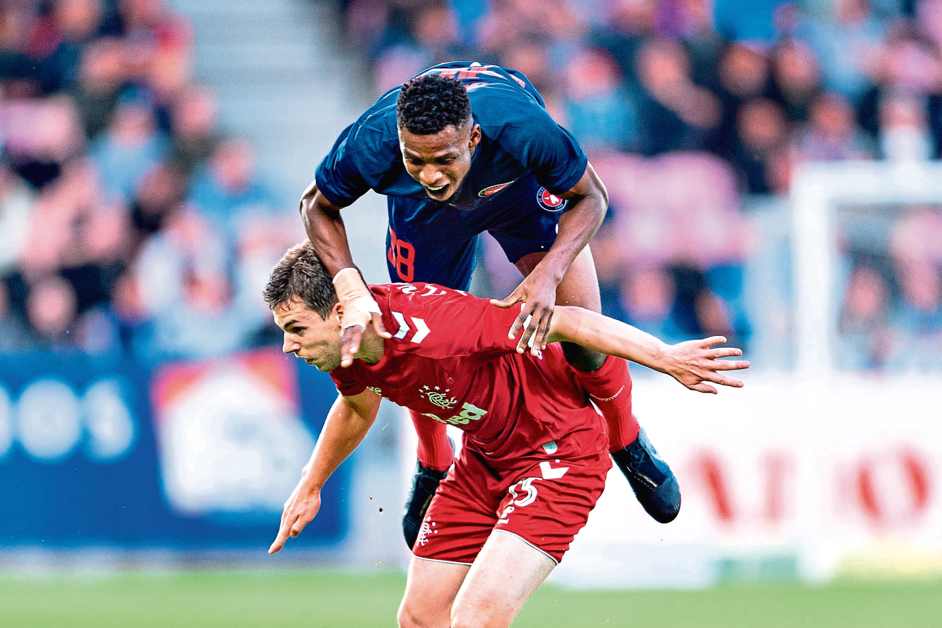 Jon Flanagan in action for Rangers in Europe