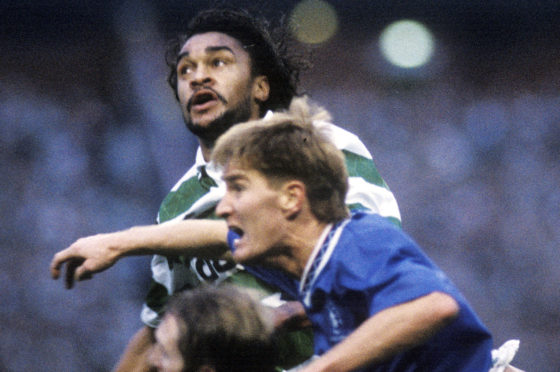 Celtic's Paul Elliott (top) outjumps Richard Gough and Gary Stevens