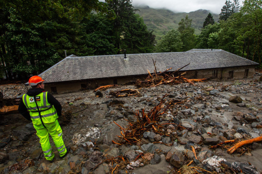 Holiday cottages on Loch Katrine with severe damage caused by landslides