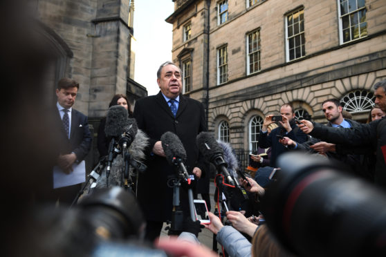 Alex Salmond outside Court of Session in January with his lawyer David McKie, from Levy & McRae, on left