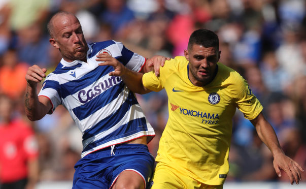 Charlie Adam battles with Mateo Kovacic of Chelsea in a friendly