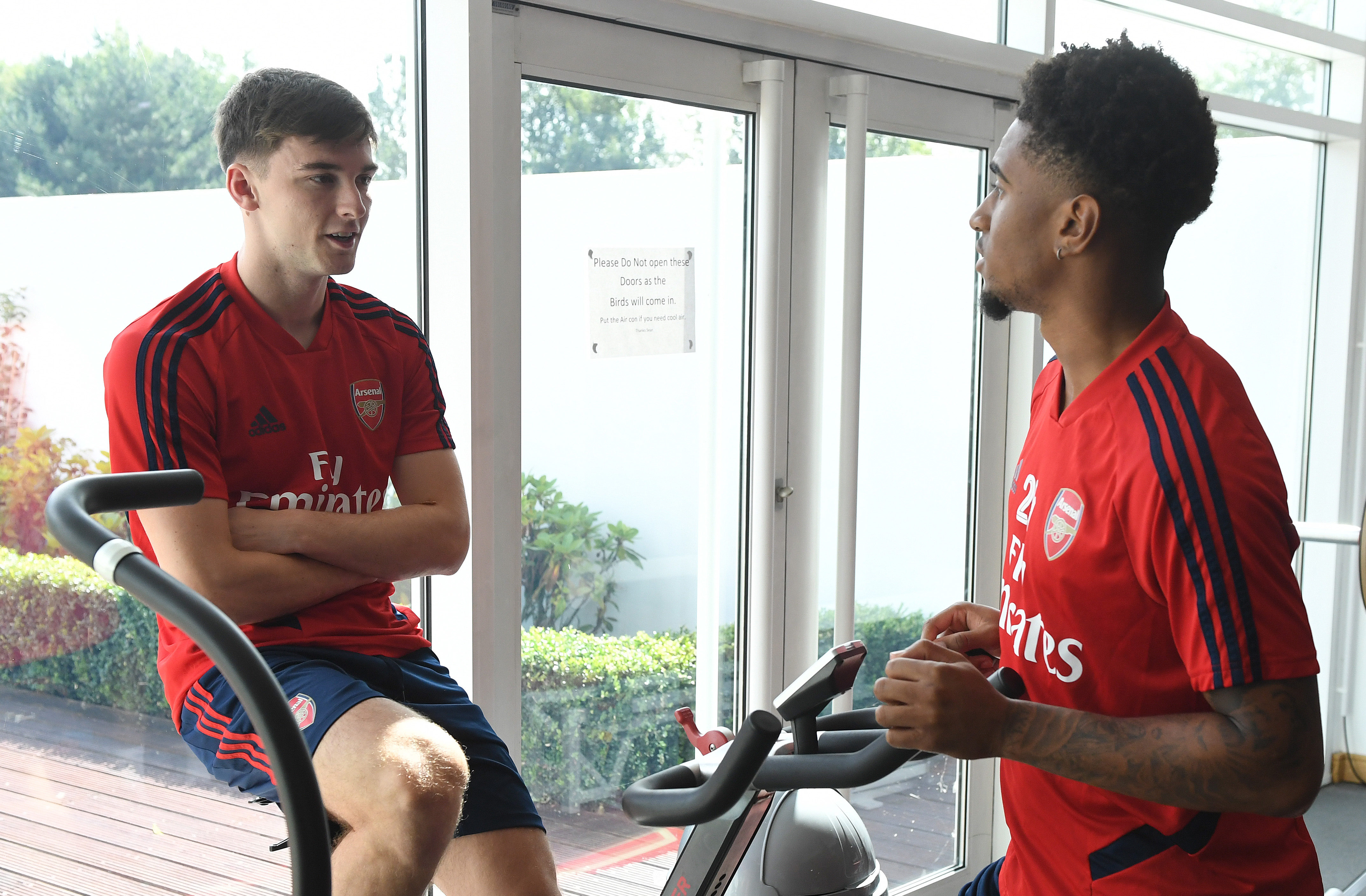 Arsenal newboy Kieran Tierney in the gym with teammate Reiss Nelson