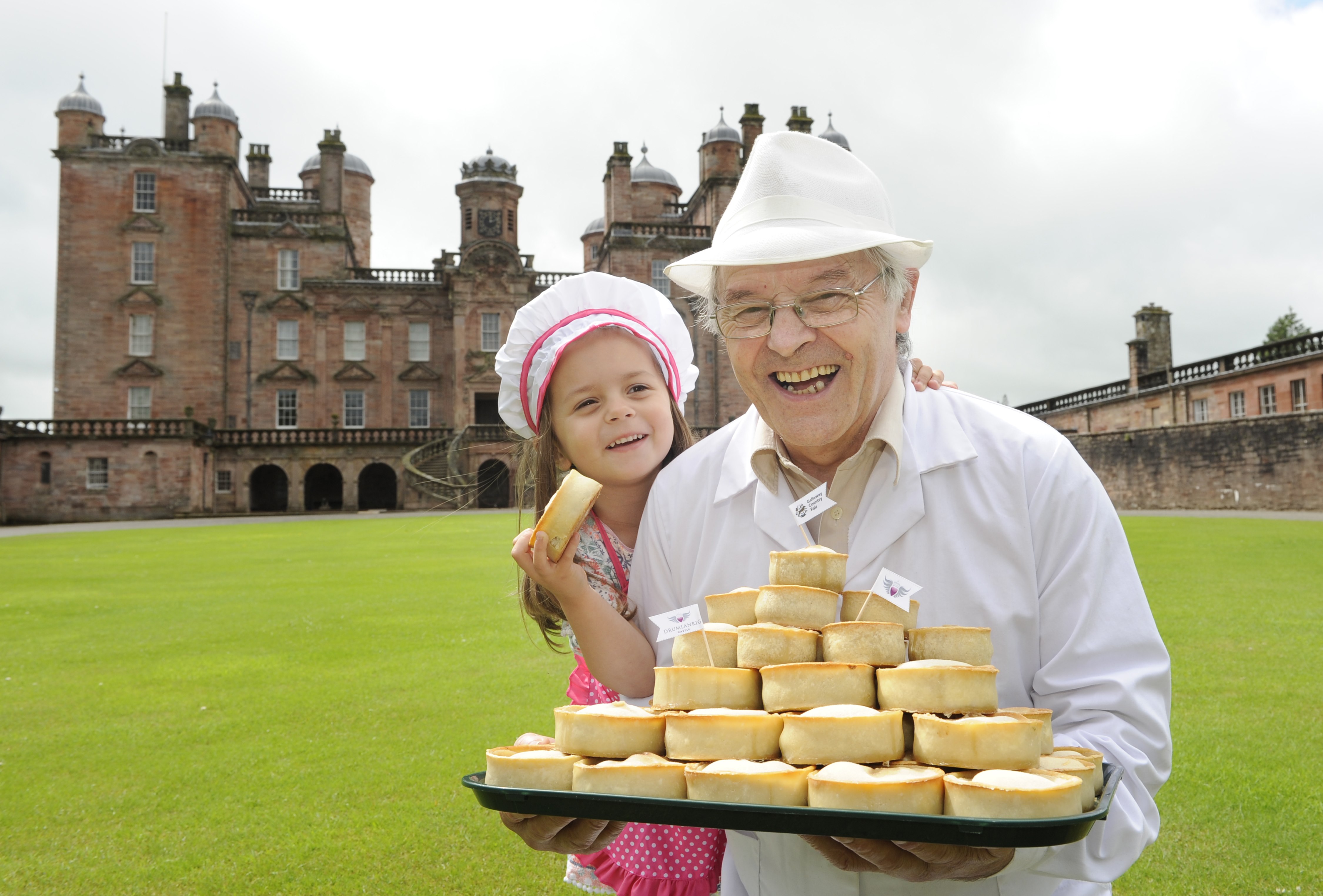Kerr Little, master baker from Dumfries, launches Galloway Country Fair 2019 with a specially selected range of pies with Holly Byrnes, age four from Uddingston,