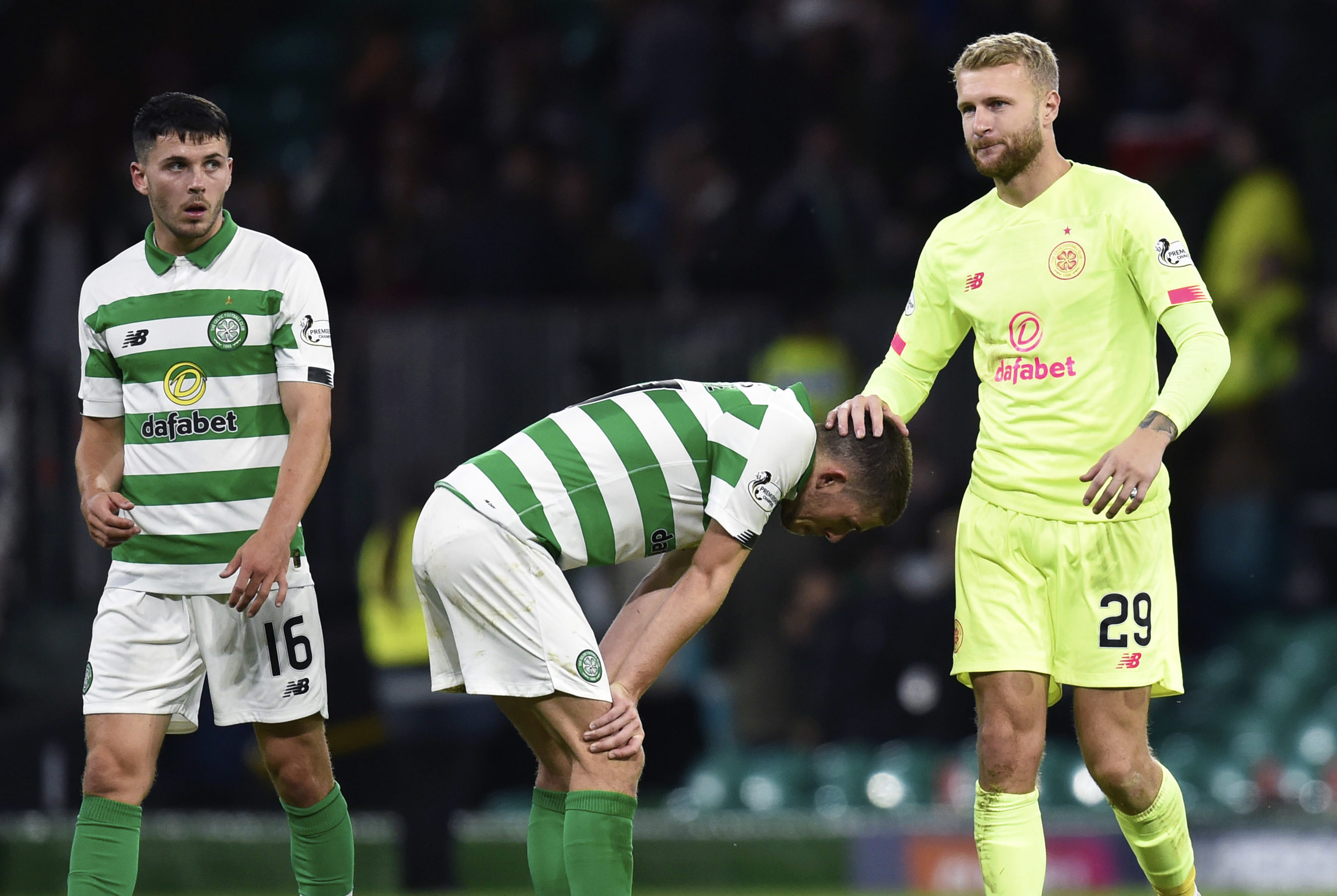 Celtic's Lewis Morgan, Ryan Christie and Scott Bain are left dejected at full-time