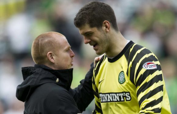 Celtic manager Neil Lennon (left) celebrates with Fraser Forster after a match in 2011