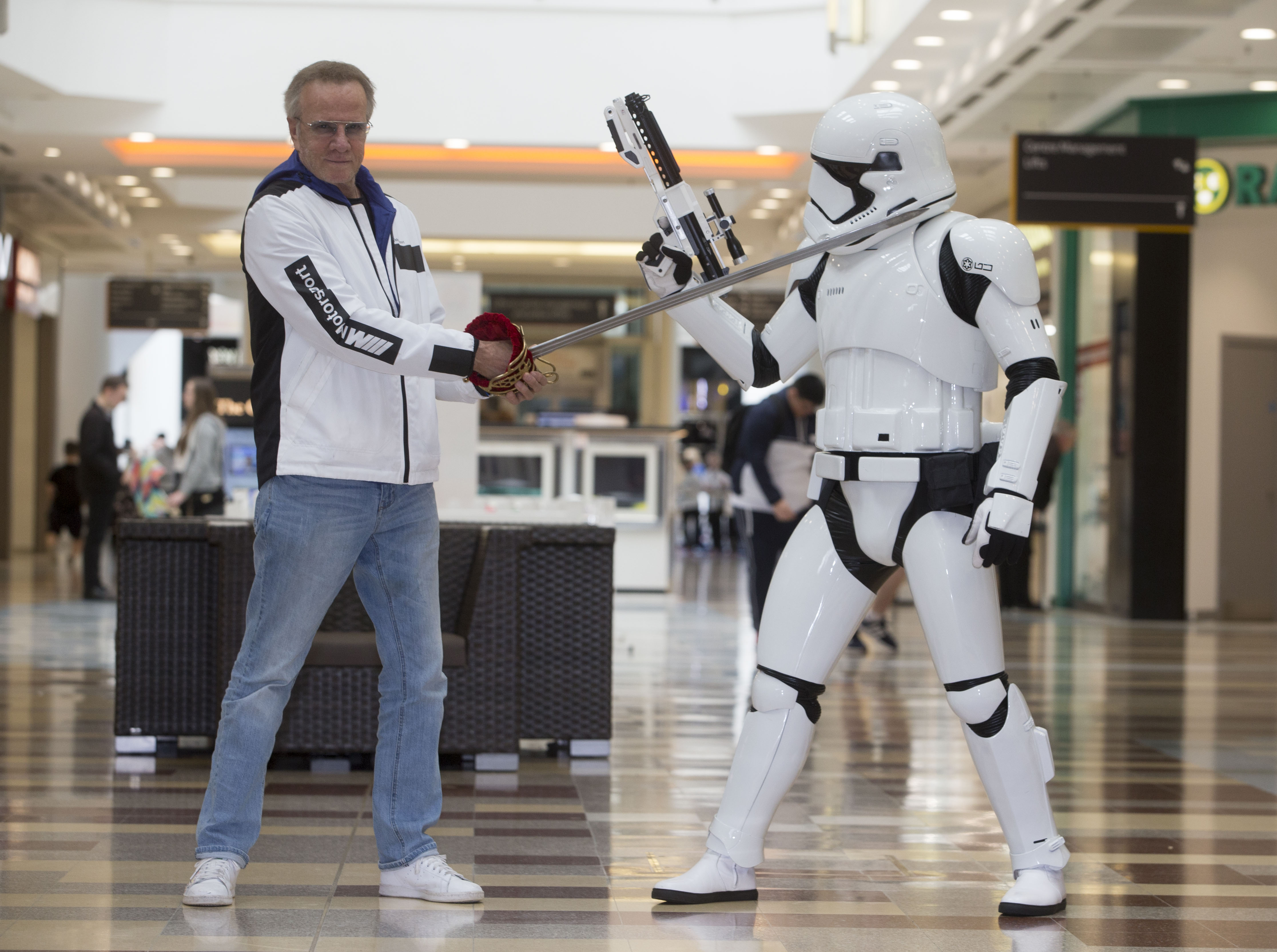 Christopher Lambert poses with a Stormtrooper