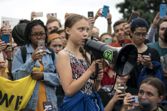 Swedish climate activist Greta Thunberg with other student environmental advocates