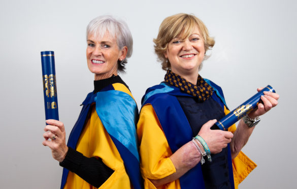 Judy and Corinne with their honorary degrees