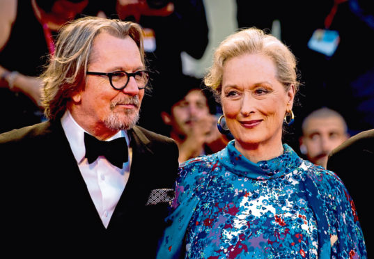 Meryl Streep with co-star Gary Oldman on the red carpet