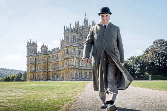 Jim Carter as Charles Carson