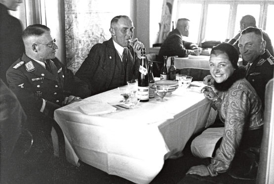 Diners aboard the Hindenburg, so-called Titanic of the Skies, in 1936