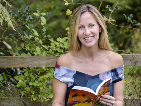 Angela Proctor, also known as AH Proctor, the author of the Thumble Tumble books, is pictured on the Isle of Arran.