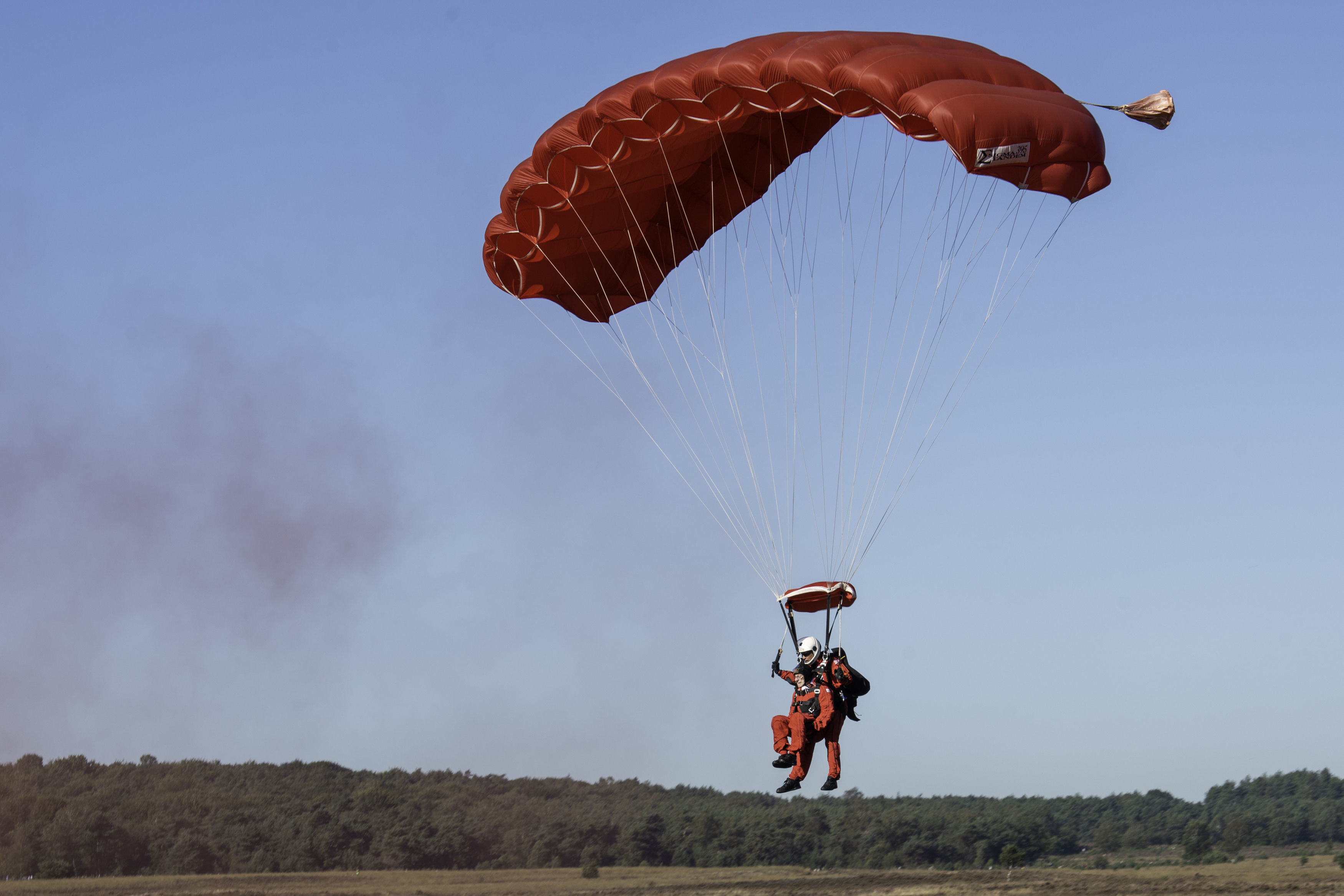 Veteran Sandy Cortmann, 97. The Parachute Regiment veteran from Aberdeen, arrived at the Ginkel Heath commemorations by a tandem jump with The Red Devils British Army Parachute display team as part of the Operation Market Garden 75th anniversary commemorations near Arnhem, Netherlands.