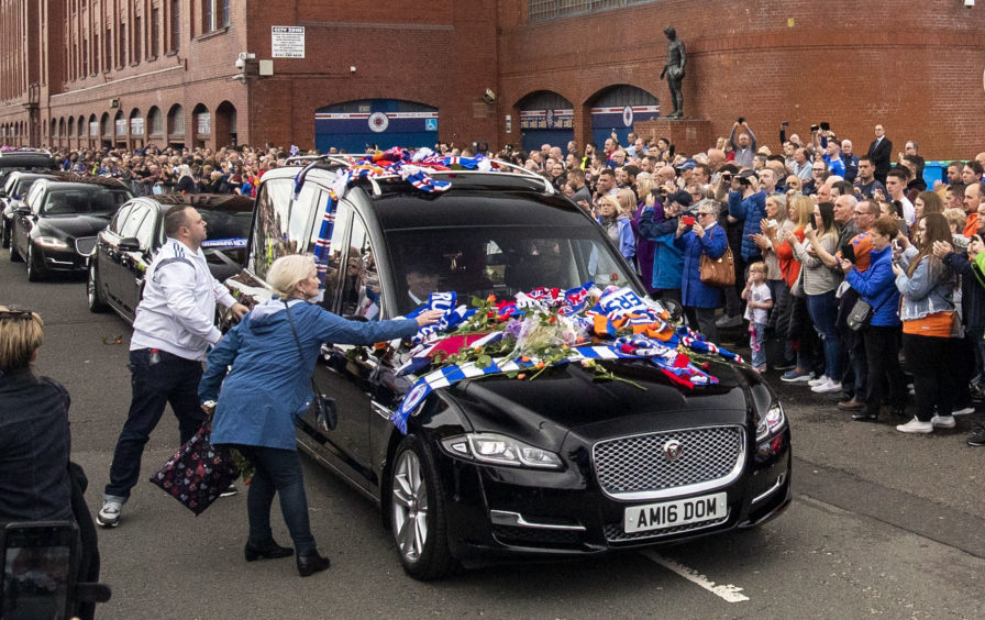 Supporters gather to pay tribute to former Rangers player Fernando Ricksen