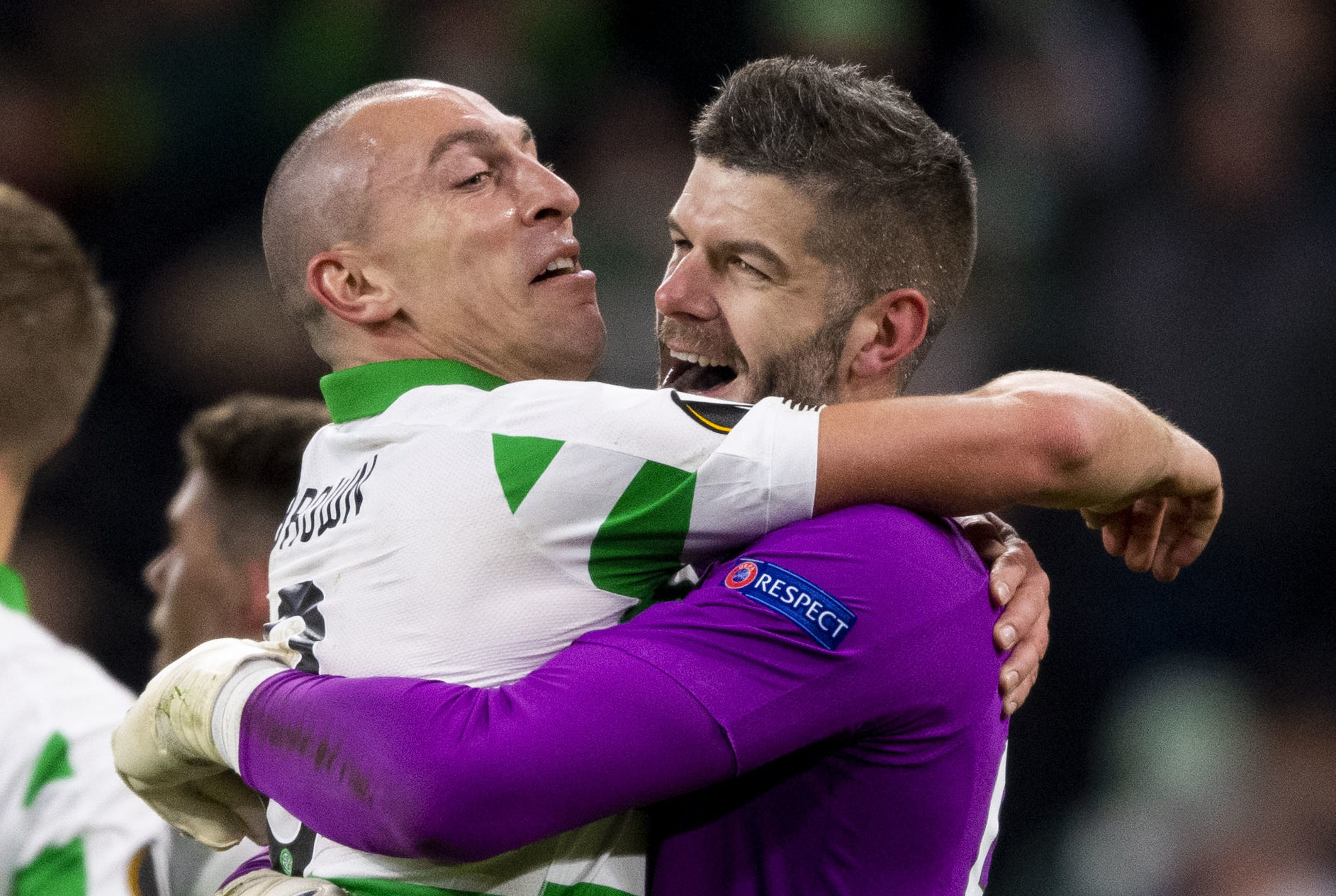 Celtic's Fraser Forster and Scott Brown celebrate at full time after the win over Lazio