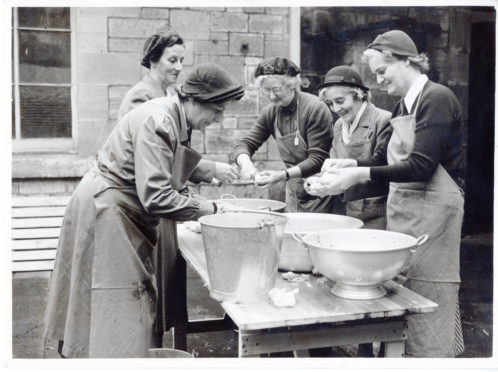 Emergency feeding exercise for 70 people, led by Mrs. J.G. Ritchie, Dumbarton, October 22, 1953.