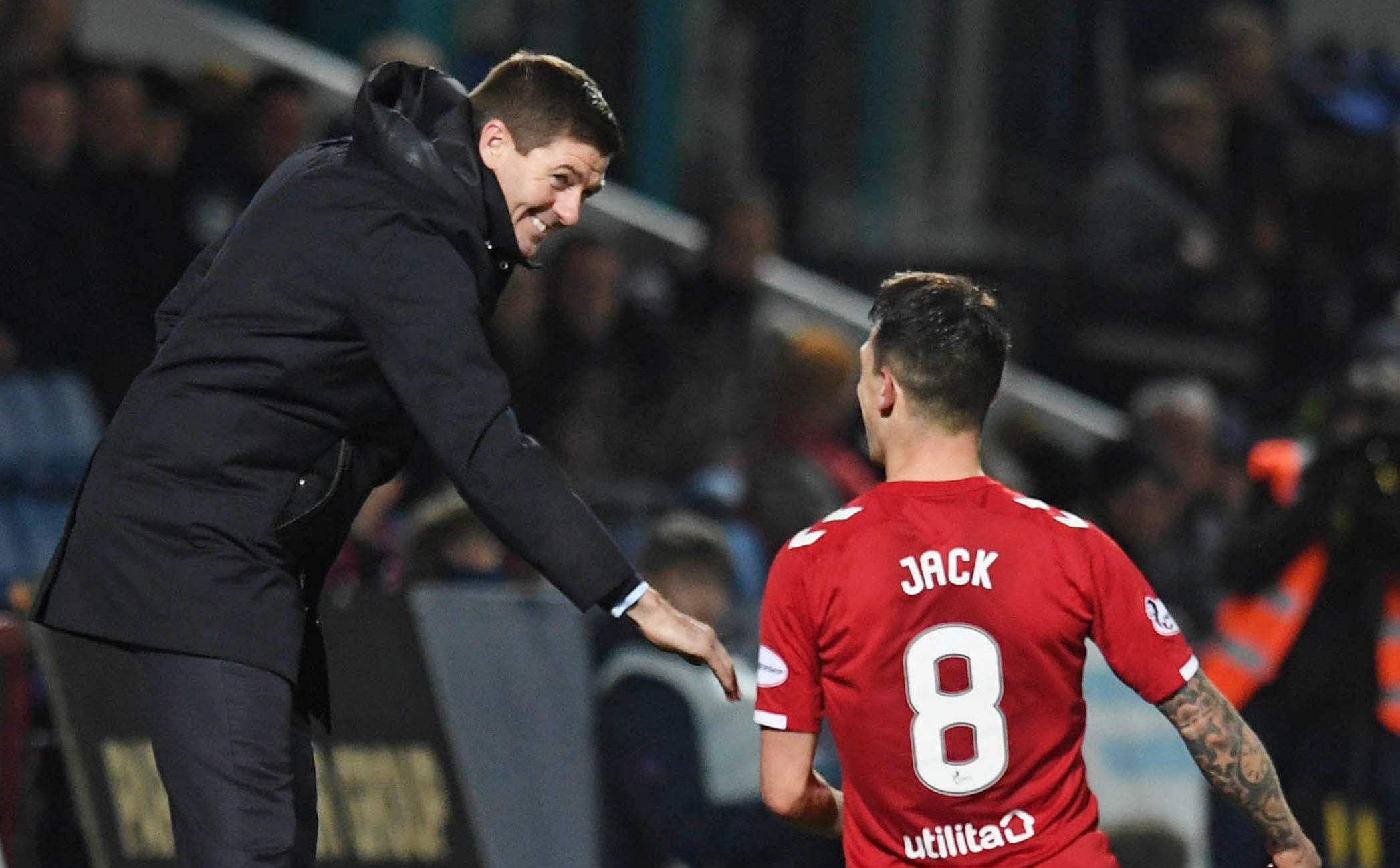 Rangers' Ryan Jack (right) celebrates his goal with manager Steven Gerrard