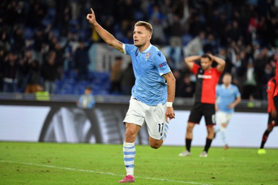 Ciro Immobile of SS Lazio celebrates a second goal against Rennes