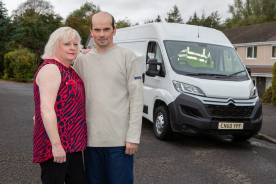 Malcolm Brown and wife Marion with the Citroen which has now been repaired