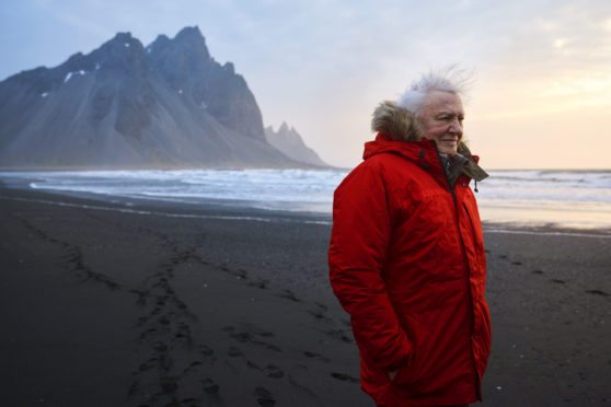 Sir David Attenborough on location filming Seven Worlds, One Planet on Stokksnes beach in Iceland