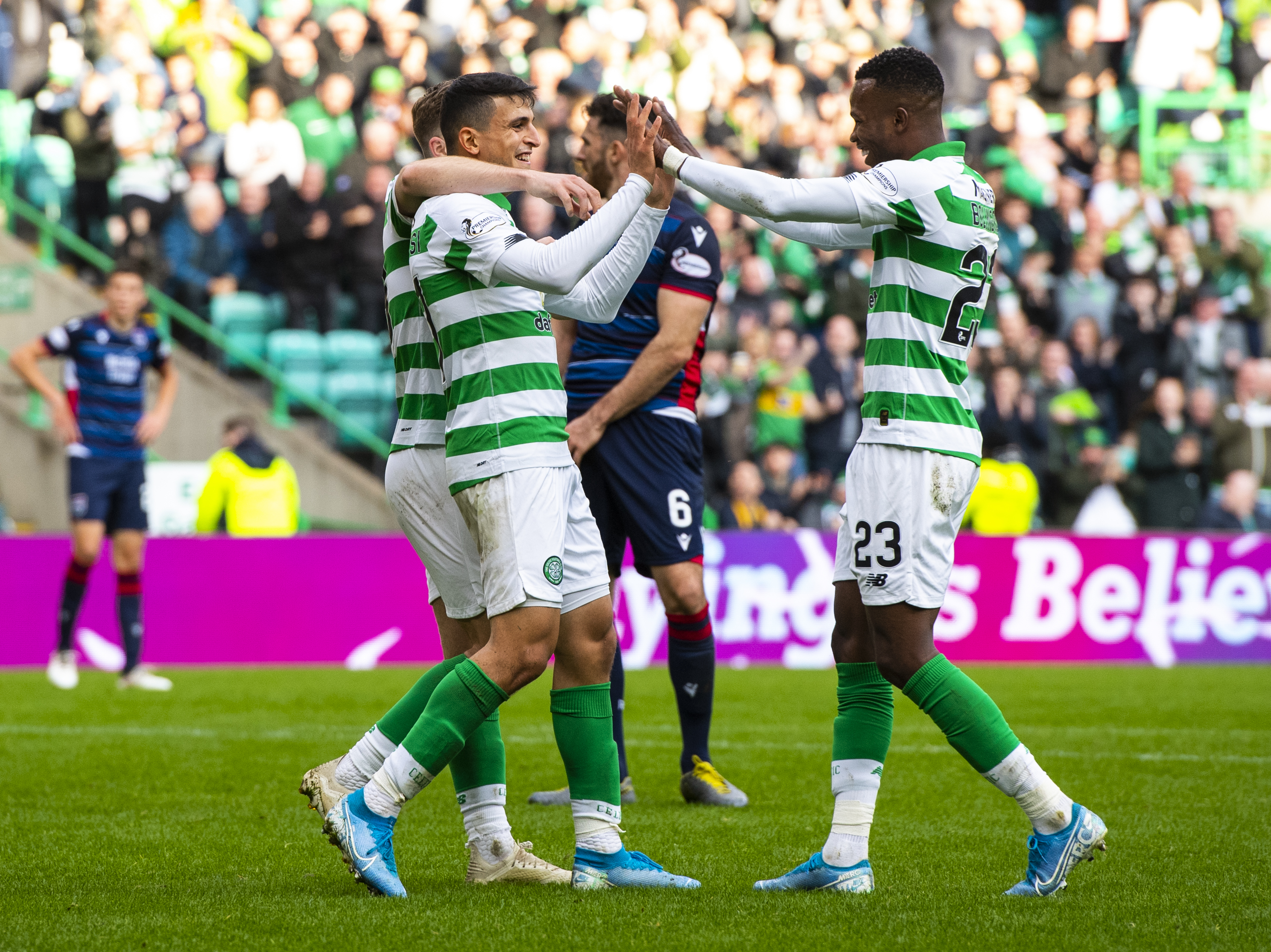 Celtic's Mohammed Elyounoussi celebrates with Boli Bolignoli after scoring to make it 6-0