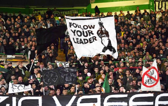 A banner depicting hanged Italian dictator Benito Mussolini is displayed by home supporters during Thursday’s Europa League match at Celtic Park